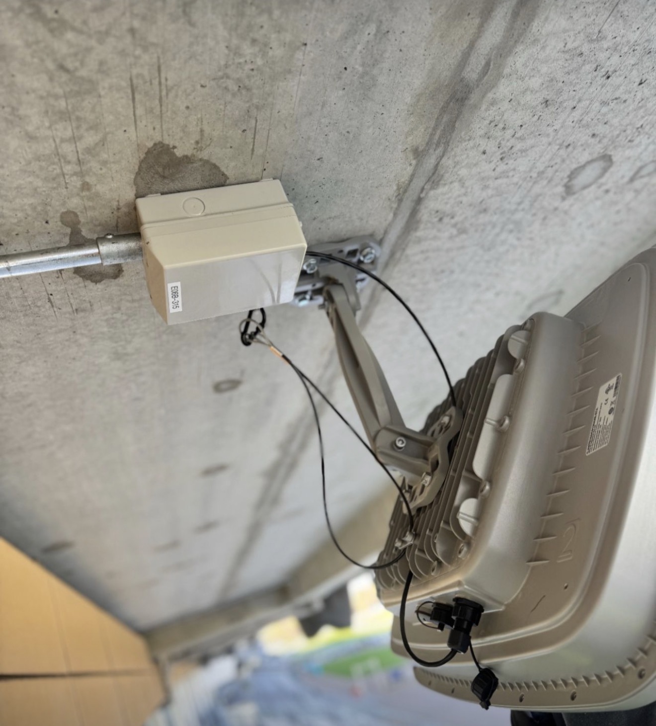 Conduit-mounted Cisco access point beneath Royal Ascot grandstand